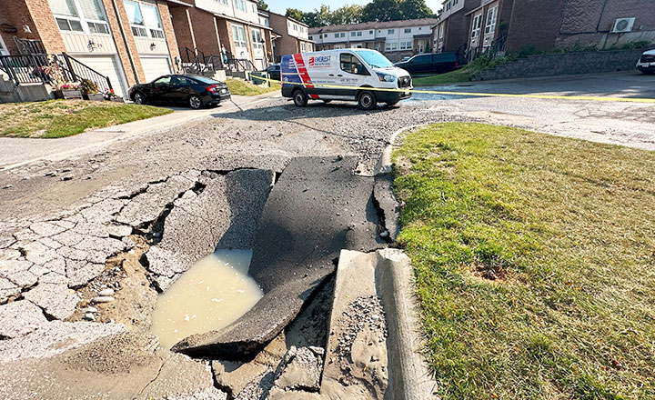 collaspe parking lot due to water main break